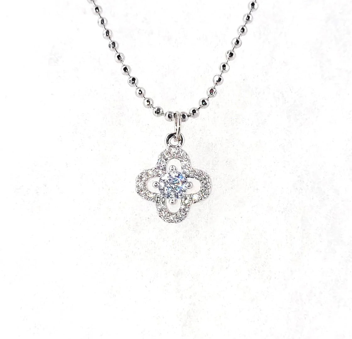 SILVER OPEN PAVE CLOVER NECKLACE WITH CUBIC ZIRCONIA STONES